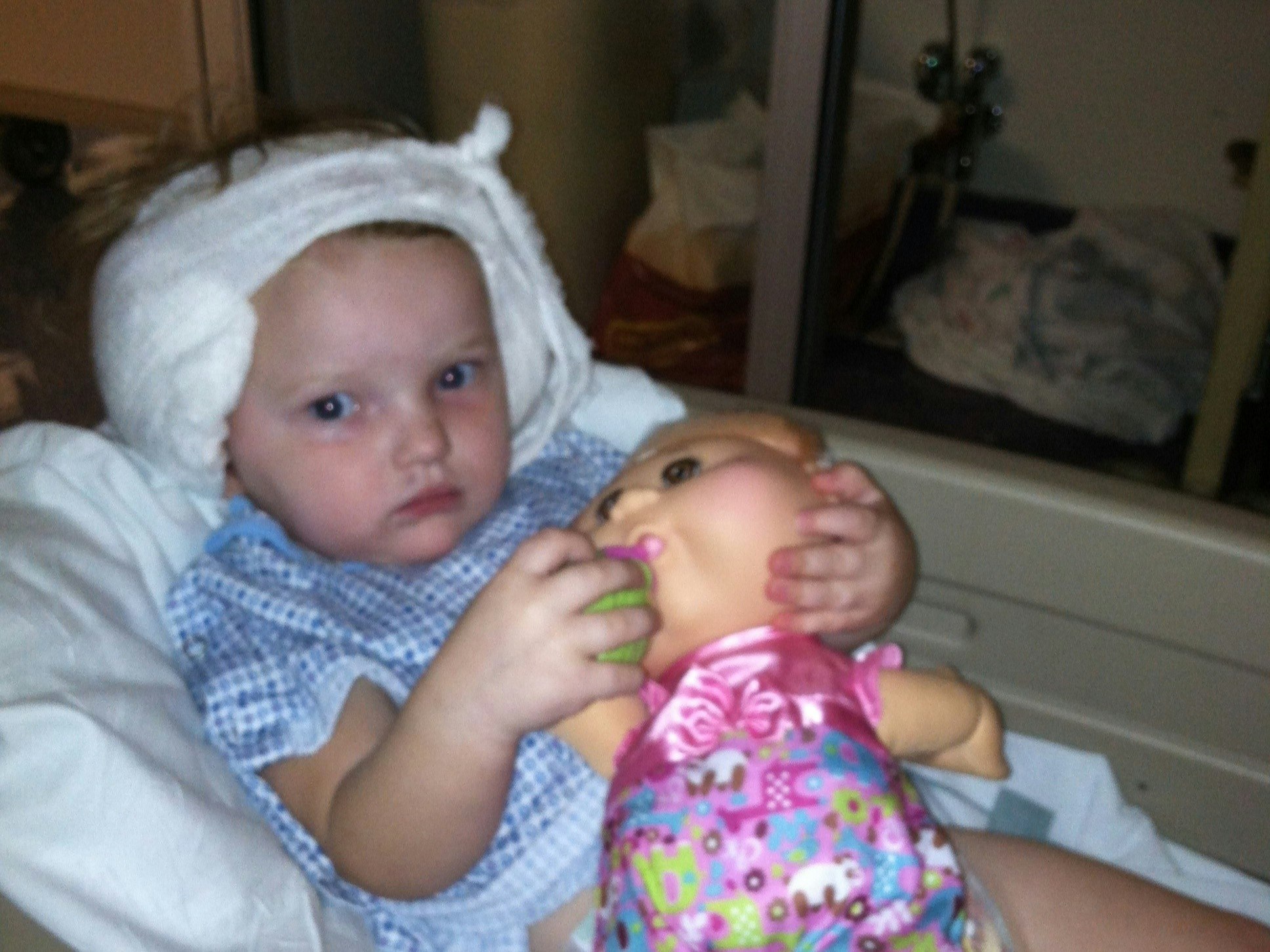 Recipient Daisy in a bed post implant surgery